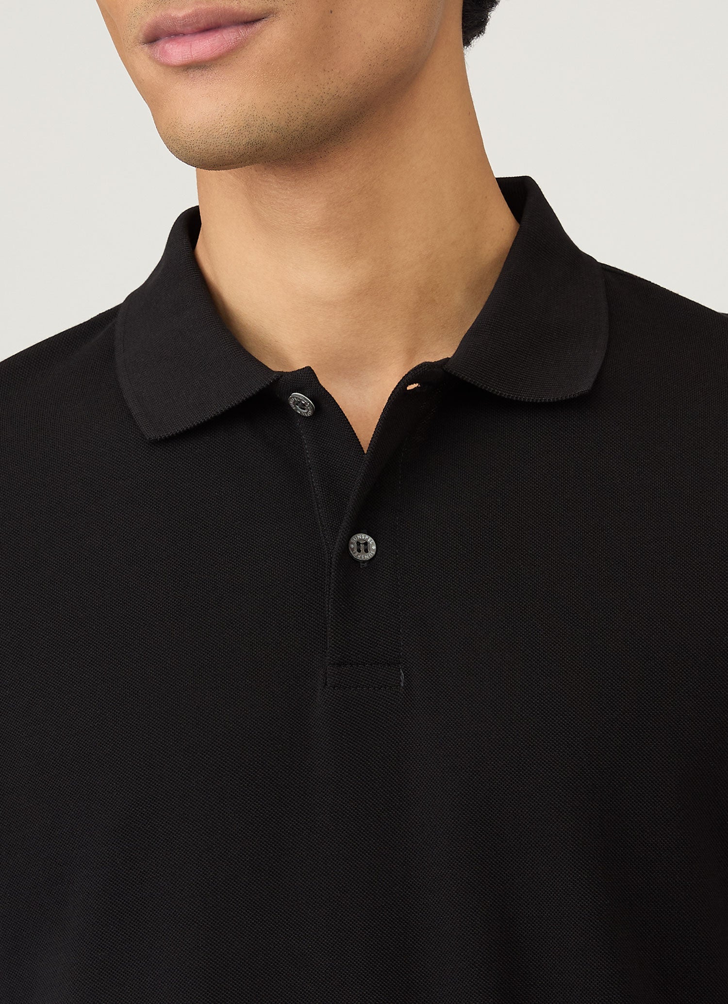 Men's Piqué Polo Shirt in Black | Sunspel