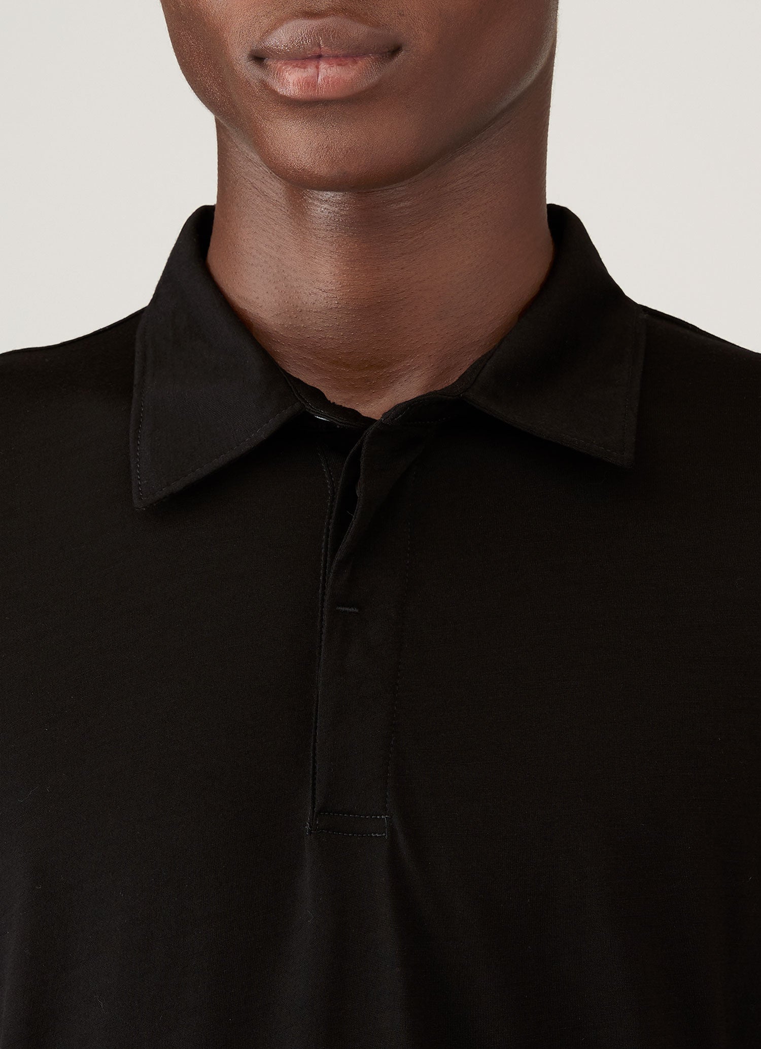 Men's Long Sleeve Ultra-Fine Merino Polo Shirt in Black | Sunspel